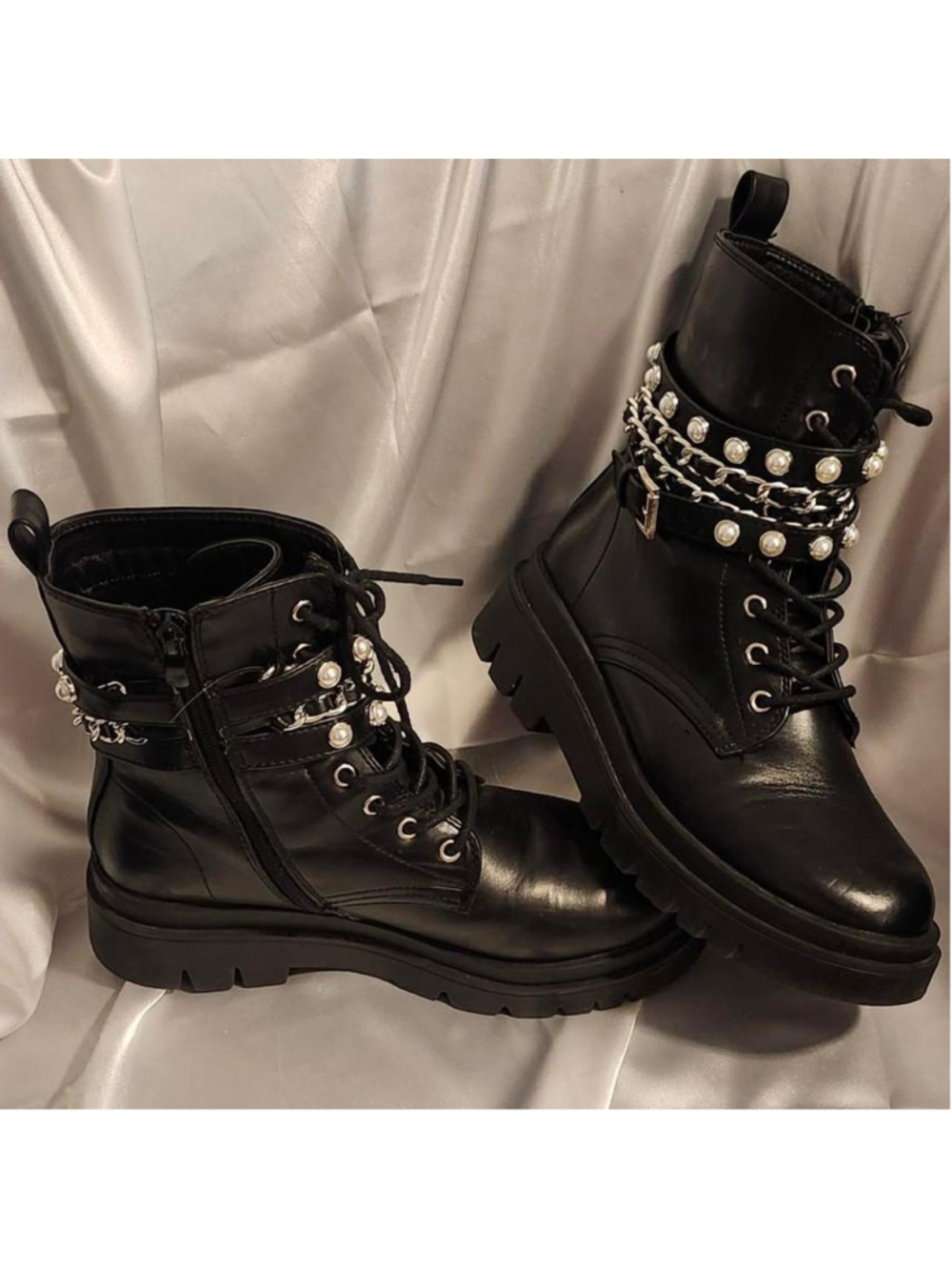 Black faux leather combat boots with silver chains in size 8
